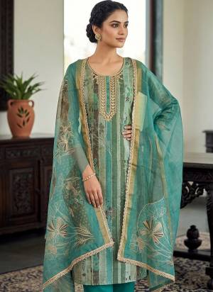 Garb These Suit in Fine Colored Pair With Bottom And Dupatta.These Top Are Cotton Linen Simmer And Dupatta Are Fabricated On Cotton Linen Simmer Pair With Rayon Bottom.Its Beautified With Designer Printed, Hand Work.