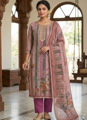 Garb These Suit in Fine Colored Pair With Bottom And Dupatta.These Top Are Cotton Linen Simmer And Dupatta Are Fabricated On Cotton Linen Simmer Pair With Rayon Bottom.Its Beautified With Designer Printed, Hand Work.