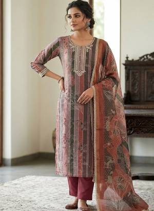 Garb These Suit in Fine Colored Pair With Bottom And Dupatta.These Top Are Cotton Linen Simmer And Dupatta Are Fabricated On Cotton Linen Simmer Pair With Rayon Bottom.Its Beautified With Designer Printed, Hand Work.