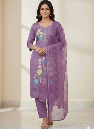 Garb This Suits In Lovely Color.Its Pretty Top Is Roman Silk Based Paired Bottom Santoon And Naznin Fabricated Dupatta Are Designer Embroidery Work. Which Gives An Attractive To The Dress.