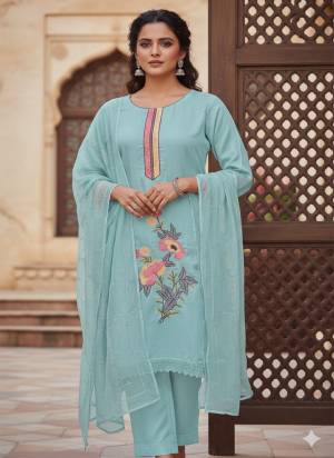 Garb This Suits In Lovely Color.Its Pretty Top Is Roman Silk Based Paired Bottom Santoon And Naznin Fabricated Dupatta Are Designer Embroidery Work. Which Gives An Attractive To The Dress.
