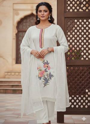Garb This Suits In Lovely Color.Its Pretty Top Is Roman Silk Based Paired Bottom Santoon And Naznin Fabricated Dupatta Are Designer Embroidery Work. Which Gives An Attractive To The Dress.