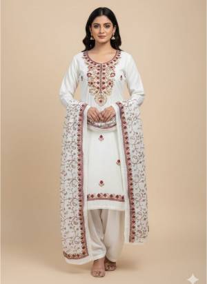 Looking This Suits In Lovely Color.Its Pretty Top Is Roman Silk Based Paired Bottom Santoon And Dyble Chanderi Fabricated Dupatta Are Designer Embroidery Work. Which Gives An Attractive To The Dress.