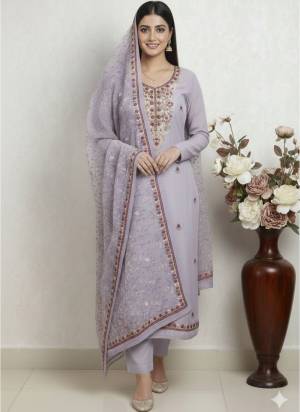 Looking This Suits In Lovely Color.Its Pretty Top Is Roman Silk Based Paired Bottom Santoon And Dyble Chanderi Fabricated Dupatta Are Designer Embroidery Work. Which Gives An Attractive To The Dress.