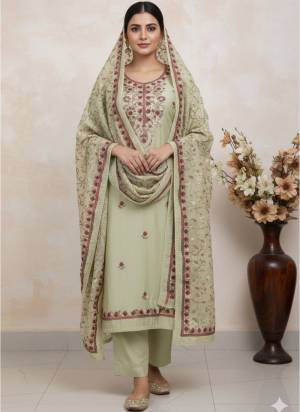 Looking This Suits In Lovely Color.Its Pretty Top Is Roman Silk Based Paired Bottom Santoon And Dyble Chanderi Fabricated Dupatta Are Designer Embroidery Work. Which Gives An Attractive To The Dress.