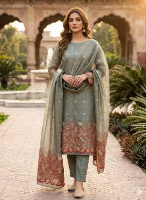 Garb This Suits In Lovely Color.Its Pretty Top Is Jacquard Silk Based Paired Bottom Santoon And Jacquard Silk Fabricated Dupatta Are Woven Jamdani Jacquard Designer. Which Gives An Attractive To The Dress.