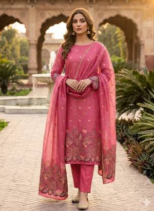Garb This Suits In Lovely Color.Its Pretty Top Is Jacquard Silk Based Paired Bottom Santoon And Jacquard Silk Fabricated Dupatta Are Woven Jamdani Jacquard Designer. Which Gives An Attractive To The Dress.