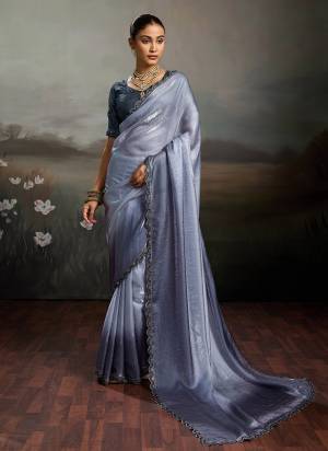 Garb These Fancy Party Wear Saree in Fine Colored.These Saree Are Satin And Blouse is Satin Fabricated.Its Beautified With Pedding Color Designer With Embroidery Work Blouse.