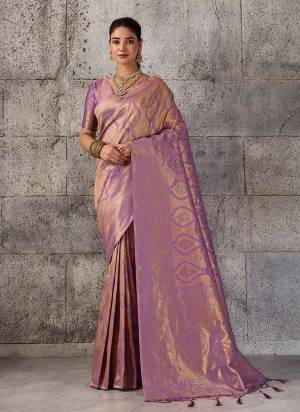 Attractive These Fastive And Party Wear Saree in Fine Colored.These Saree And Blouse is Fabricated On Kanjivaram Blend.Its Beautified With Woven Jari Jacquard Designer.