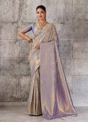 Attractive These Fastive And Party Wear Saree in Fine Colored.These Saree And Blouse is Fabricated On Kanjivaram Blend.Its Beautified With Woven Jari Jacquard Designer.