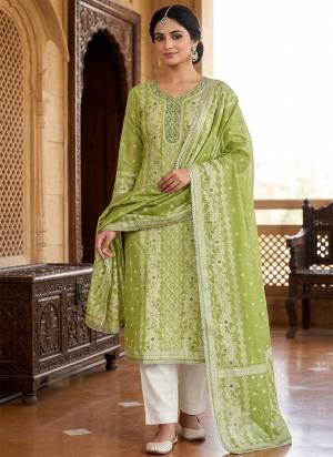 Looking These Suit in Fine Colored Pair With Bottom And Dupatta.These Top Are Banarasi Cotton And Dupatta Are Fabricated On Banarasi Cotton Pair With Rayon Bottom.Its Beautified With Woven Jacquard Designer,Hand Work.