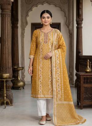 Looking These Suit in Fine Colored Pair With Bottom And Dupatta.These Top Are Banarasi Cotton And Dupatta Are Fabricated On Banarasi Cotton Pair With Rayon Bottom.Its Beautified With Woven Jacquard Designer,Hand Work.