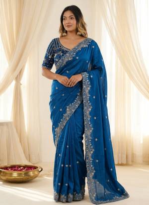 Looking These Party Wear Saree in Fine Colored.These Saree Are Fendy Satin Silk And Blouse is Fabricated On Fendy Satin Silk.Its Beautified With Designer Sequance,Jari Embroidery Work.