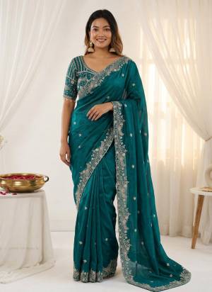 Looking These Party Wear Saree in Fine Colored.These Saree Are Fendy Satin Silk And Blouse is Fabricated On Fendy Satin Silk.Its Beautified With Designer Sequance,Jari Embroidery Work.