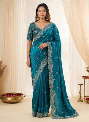 Looking These Party Wear Saree in Fine Colored.These Saree Are Fendy Satin Silk And Blouse is Fabricated On Fendy Satin Silk.Its Beautified With Designer Sequance,Jari Embroidery Work.