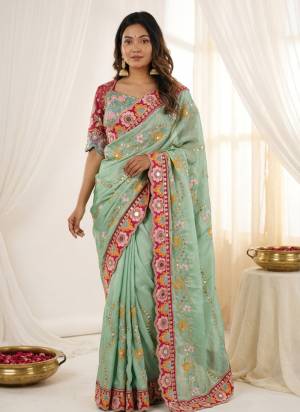 Garb These Party Wear Saree in Fine Colored.These Saree Are Rangoli Silk And Blouse is Fabricated On Mono Banglori.Its Beautified With Designer Sequance,Dori,Mirror Embroidery Work.