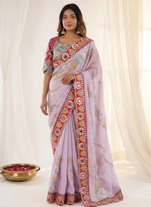 Garb These Party Wear Saree in Fine Colored.These Saree Are Rangoli Silk And Blouse is Fabricated On Mono Banglori.Its Beautified With Designer Sequance,Dori,Mirror Embroidery Work.