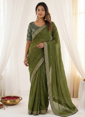 Looking These Party Wear Saree in Fine Colored.These Saree Are Rangoli Silk And Blouse is Fabricated On Rangoli Silk.Its Beautified With Designer Sequance,Jari Embroidery Work.