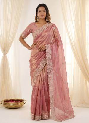 Garb These Party Wear Saree in Fine Colored.These Saree Are Fendy Satin And Blouse is Fabricated On Fendy Satin.Its Beautified With Designer C Pallu Dori Embroidery Work.