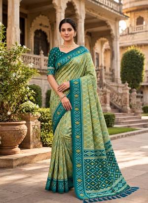 Attractive These Party Wear Saree in Fine Colored.These Saree Are Patola Silk And Blouse is Fabricated On Patola Silk.Its Beautified With Weaving Jacquard Meenakari Designer.