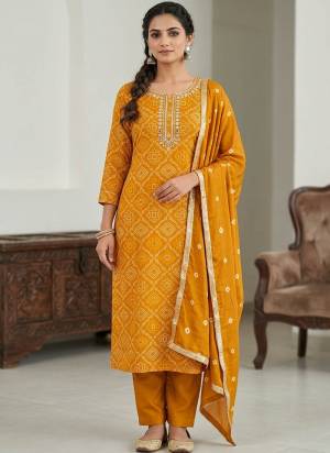 Looking These Suit in Fine Colored Pair With Bottom And Dupatta.These Top Are Jam Cotton And Dupatta Are Fabricated On Naznin Pair With Cotton Bottom.Its Beautified With Bandhani Printed Designer,Embroidery Work.