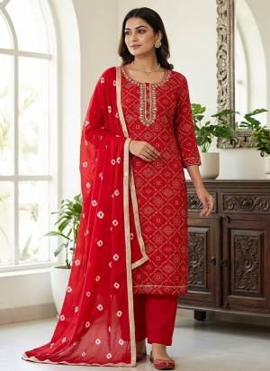 Looking These Suit in Fine Colored Pair With Bottom And Dupatta.These Top Are Jam Cotton And Dupatta Are Fabricated On Naznin Pair With Cotton Bottom.Its Beautified With Bandhani Printed Designer,Embroidery Work.