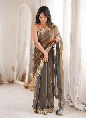 Garb These Fancy Party Wear Saree in Fine Colored.These Saree Are Fendy Satin And Blouse is Fendy Satin Fabricated.Its Beautified With Sequance Embroidery Work.