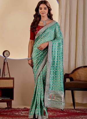 Garb This Party Wear Saree Paired With Blouse.This Saree Are Vichitra Silk And Blouse Are Banglori Silk Fabric With Designer Teble Printed Bandhani With Thread,Sequance Embroidery,Diamond Work. Buy This Pretty Saree Now.