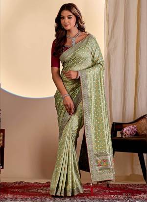 Garb This Party Wear Saree Paired With Blouse.This Saree Are Vichitra Silk And Blouse Are Banglori Silk Fabric With Designer Teble Printed Bandhani With Thread,Sequance Embroidery,Diamond Work. Buy This Pretty Saree Now.