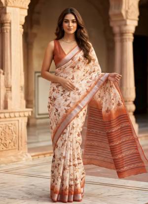 Attrective Looking These Party Wear Saree in Fine Colored.These Saree Are Linen Silk And Blouse is Fabricated On Linen Silk.Its Beautified With Woven Jari Border Designer With Floral Printed.
