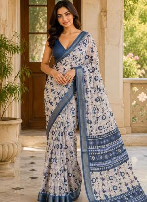 Attrective Looking These Party Wear Saree in Fine Colored.These Saree Are Linen Silk And Blouse is Fabricated On Linen Silk.Its Beautified With Woven Jari Border Designer With Floral Printed.
