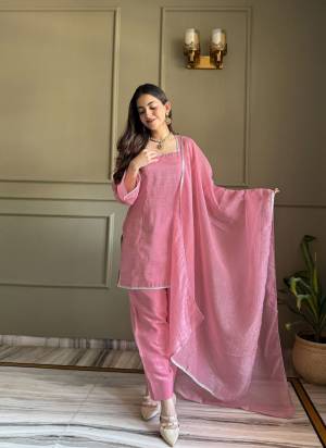 Looking These Suit in Fine Colored Pair With Bottom And Dupatta.These Top Are Crunchy Silk And Bottom Are Fabricated On Crunchy Silk Pair With Crunchy Silk Dupatta.Its Beautified With Designer Zardosi Hand Work.