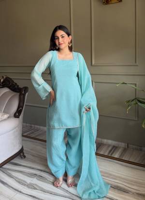 Looking These Suit in Fine Colored Pair With Bottom And Dupatta.These Top Are Crunchy Silk And Bottom Are Fabricated On Crunchy Silk Pair With Crunchy Silk Dupatta.Its Beautified With Designer Zardosi Hand Work.