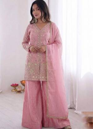 Looking These Suit in Fine Colored Pair With Bottom And Dupatta.These Top Are Fendy Satin And Bottom Are Fabricated On Fendy Satin Pair With Fendy Satin Dupatta.Its Beautified With Designer Embroidery Work.
