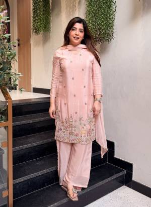 Looking These Suit in Fine Colored Pair With Bottom And Dupatta.These Top Are Crepe And Bottom Are Fabricated On Crepe Pair With Naznin Dupatta.Its Beautified With Designer Embroidery Work.