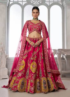 For A Designer Look,Grab These Lehenga Choli in Fine Colored.These Lehenga And Choli Are Fabricated On Silk Pair With Soft Net Dupatta.Its Beautified With Designer Embroidery,Hand Work.