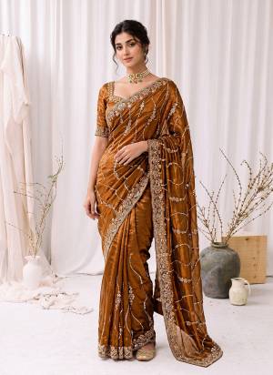 Looking These Fancy Party Wear Saree in Fine Colored.These Saree Are Space Silk And Blouse is Space Silk Fabricated.Its Beautified With Sequance,Cut Dana Gold Beads Hand Work.