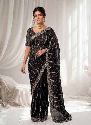 Looking These Fancy Party Wear Saree in Fine Colored.These Saree Are Space Silk And Blouse is Space Silk Fabricated.Its Beautified With Sequance,Cut Dana Gold Beads Hand Work.