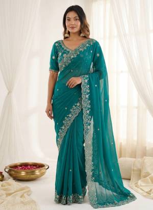 Attractive These Party Wear Saree in Fine Colored.These Saree Are Fendy Satin And Blouse is Fabricated On Fendy Satin.Its Beautified With Designer Sequance,Jari Embroidery,Cut Work.