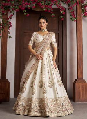 For A Designer Look,Grab These Lehenga Choli in Fine Colored.These Lehenga And Choli Are Fabricated On Silk Pair With Soft Net Dupatta.Its Beautified With Designer Embroidery,Hand Work.