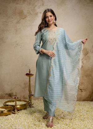 Garb These Suit in Fine Colored Pair With Bottom And Dupatta.These Top Are Roman Silk And Bottom Are Fabricated On Raman Silk Pair With Tabby Dupatta.Its Beautified With Designer Embroidery Work.
