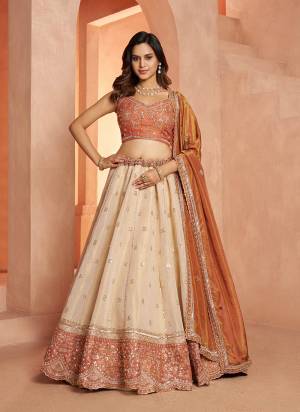 For A Designer Look,Grab These Lehenga Choli in Fine Colored.These Lehenga And Choli Are Fabricated On Kanjivaram Tissue Pair With Tissue Dupatta.Its Beautified With Designer Embroidery,Hand Work.