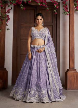 For A Designer Look,Grab These Lehenga Choli in Fine Colored.These Lehenga And Choli Are Fabricated On Jari Tissue Pair With Jari Tissue Dupatta.Its Beautified With Designer Embroidery,Hand Work.