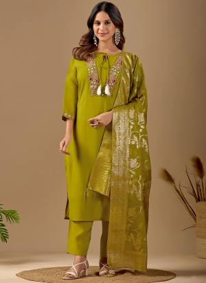 Garb These Suit in Fine Colored Pair With Bottom And Dupatta.These Top Are Mul Chanderi And Bottom Are Fabricated On Roman Silk Pair With Jacquard Silk Dupatta.Its Beautified With Designer Embroidery Work.