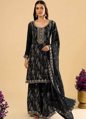 Attractive These Party Wear Designer Plazzo Suit in Fine Colored Pair With Bottom And Dupatta.These Top Are Fendy Silk And Bottom Are Fabricated On Fendy Silk Pair With Fendy Silk Dupatta.Its Beautified With Designer Embroidery With Deads Cut Dana Work.