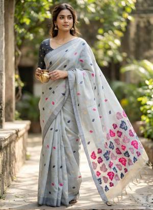 Garb These Party Wear Saree in Fine Colored.These Saree Are Linen And Blouse is Fabricated On Linen.Its Beautified With Woven Multy Thread Designer.