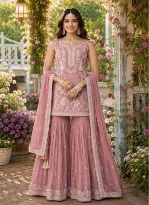  Looking These Party Wear Sharara Suit in Fine Colored Pair Sharara With Dupatta.These Top,Bottom And Dupatta Are Chiffon Fabricated.Its Beautified With Designer Heavy Sequance Embroidery,Khatli Work.