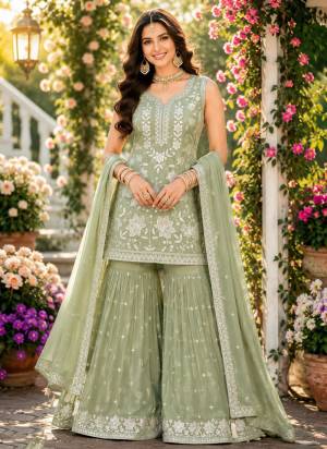  Looking These Party Wear Sharara Suit in Fine Colored Pair Sharara With Dupatta.These Top,Bottom And Dupatta Are Chiffon Fabricated.Its Beautified With Designer Heavy Sequance Embroidery,Khatli Work.