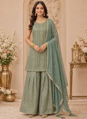Attractive These Party Wear Sharara Suit in Fine Colored Pair Sharara With Dupatta.These Top And Dupatta Are Georgette And Viscose Jacquard Bottom Fabricated.Its Beautified With Woven Jacquard Designer With Embroidery,Swarovski Zarkan Work.