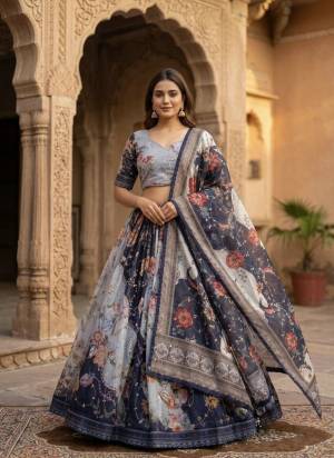 Looking These Party Wear Lehenga Choli in Fine Colored. These Lehenga And Blouse Are Tabby Silk And Dupatta Are Fabricated On Tabby Silk Fabriced. It is Beautified With Digital Printed Designer,Embroidery Work.